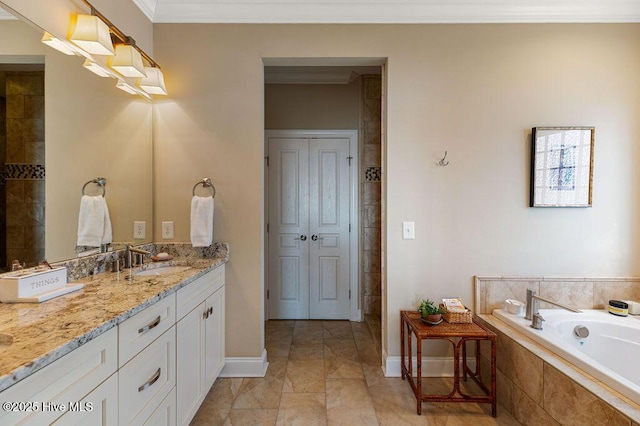 full bath featuring a relaxing tiled tub, baseboards, vanity, and ornamental molding