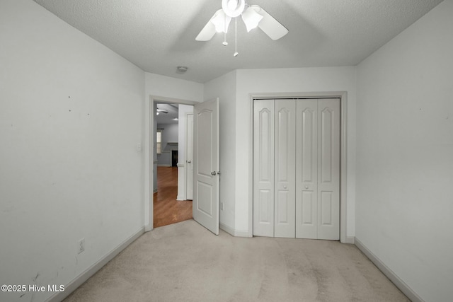 301 Derby Park Ave, New Bern, NC 28562 - unfurnished bedroom with carpet floors, baseboards, ceiling fan, and a closet