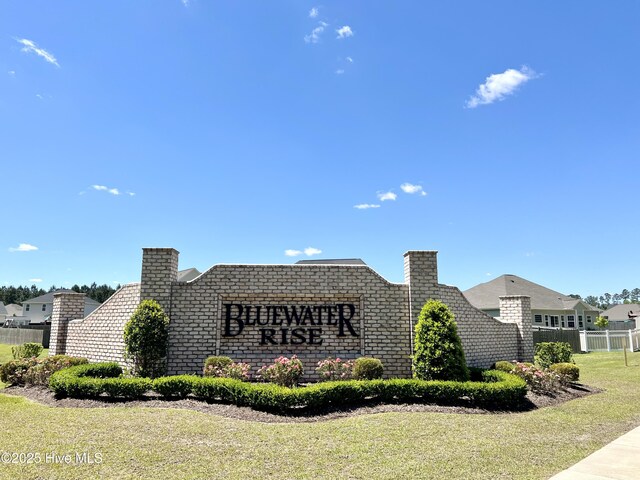2032 Bluewater Blvd, New Bern, NC 28562 - community sign with fence and a lawn