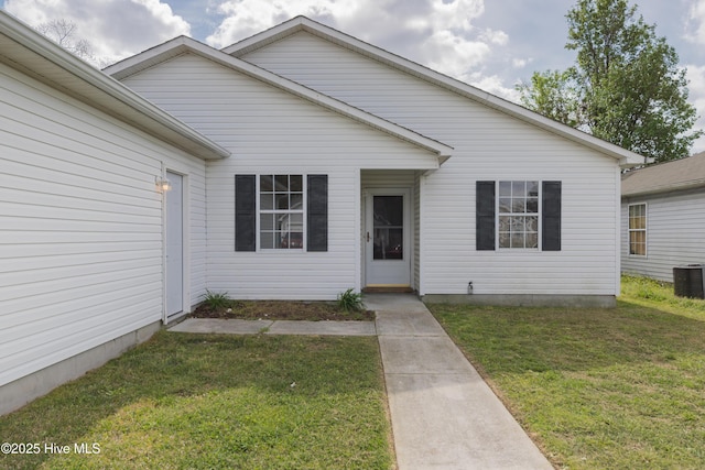 3002 E Windgate Ct, Jacksonville, NC 28546 - view of front of home featuring central AC and a front lawn
