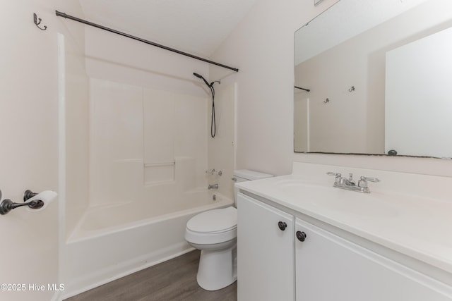 3002 E Windgate Ct, Jacksonville, NC 28546 - full bathroom with vanity, shower / bath combination, toilet, a textured ceiling, and wood finished floors