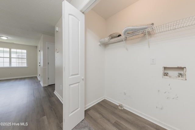 3002 E Windgate Ct, Jacksonville, NC 28546 - laundry area with washer hookup, dark wood-style floors, laundry area, baseboards, and gas dryer hookup