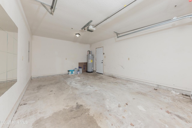 3002 E Windgate Ct, Jacksonville, NC 28546 - garage with electric water heater and a garage door opener