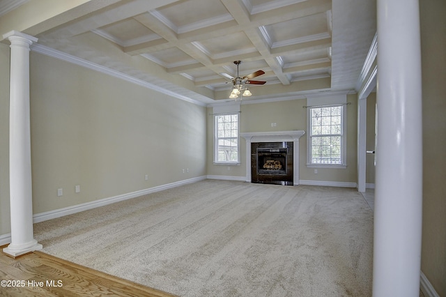 103 Whistling Duck Ct, Moyock, NC 27958 - unfurnished living room with decorative columns, ceiling fan, beamed ceiling, coffered ceiling, and ornamental molding
