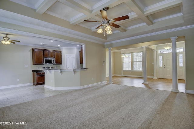 103 Whistling Duck Ct, Moyock, NC 27958 - unfurnished living room featuring decorative columns, ceiling fan, coffered ceiling, light carpet, and ornamental molding