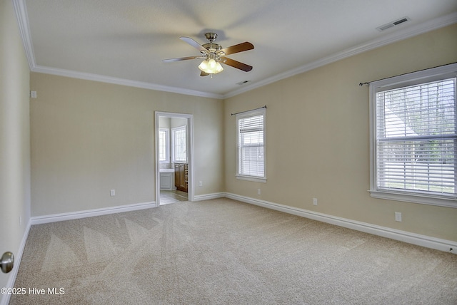 103 Whistling Duck Ct, Moyock, NC 27958 - unfurnished room with a ceiling fan, ornamental molding, light colored carpet, healthy amount of natural light, and baseboards