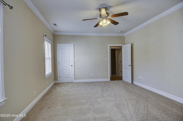 103 Whistling Duck Ct, Moyock, NC 27958 - unfurnished bedroom featuring crown molding, carpet flooring, baseboards, and ceiling fan