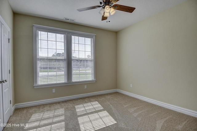 103 Whistling Duck Ct, Moyock, NC 27958 - carpeted spare room featuring a ceiling fan, healthy amount of natural light, and baseboards