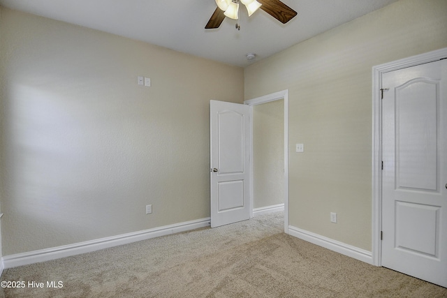 103 Whistling Duck Ct, Moyock, NC 27958 - unfurnished bedroom featuring carpet, baseboards, and ceiling fan