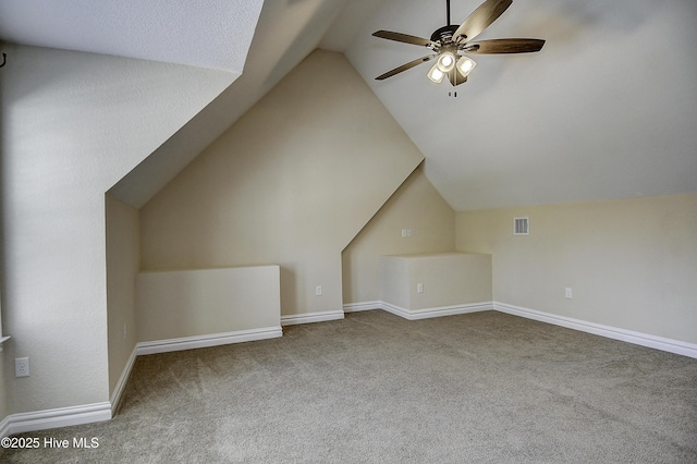 103 Whistling Duck Ct, Moyock, NC 27958 - bonus room with carpet floors, vaulted ceiling, a ceiling fan, and baseboards