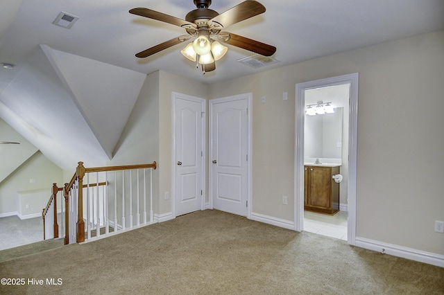 103 Whistling Duck Ct, Moyock, NC 27958 - bonus room featuring light carpet, ceiling fan, baseboards, and vaulted ceiling