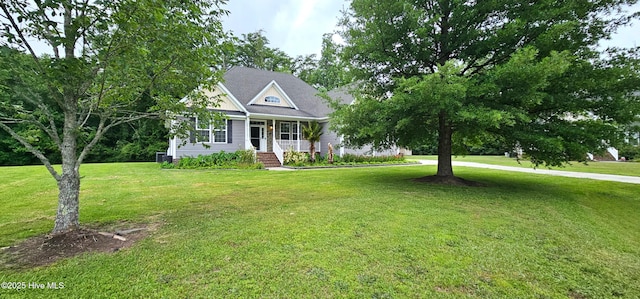 103 Whistling Duck Ct, Moyock, NC 27958 - view of front facade featuring a front yard and a porch