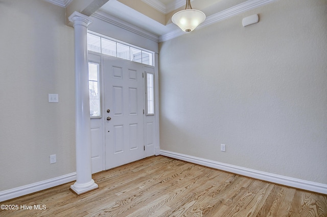103 Whistling Duck Ct, Moyock, NC 27958 - entryway with decorative columns, crown molding, light wood-style floors, and baseboards