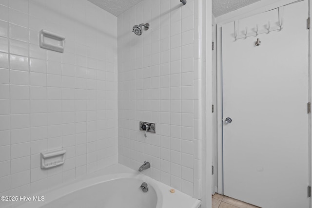 5 Pine Tree Rd Unit 211, Pinehurst, NC 28374 - full bathroom with a textured ceiling, shower / bathtub combination, and tile patterned flooring
