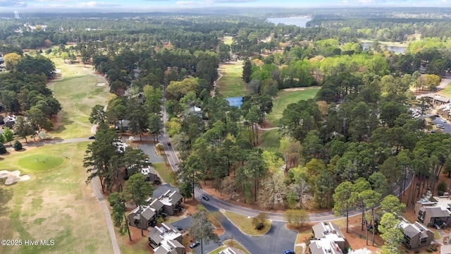 5 Pine Tree Rd Unit 211, Pinehurst, NC 28374 - view of property location featuring a golf club, a heavily wooded area, and a large body of water