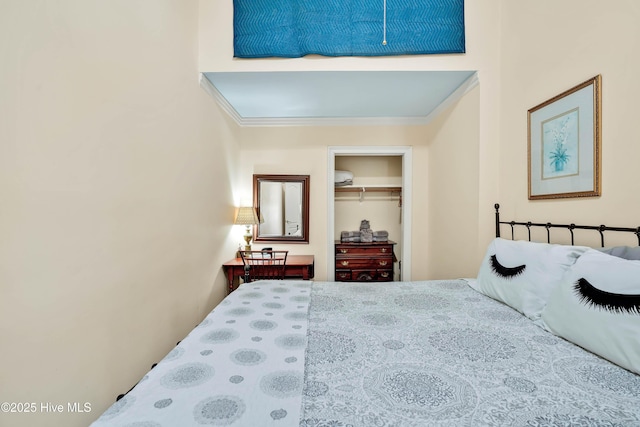 bedroom featuring a closet and ornamental molding
