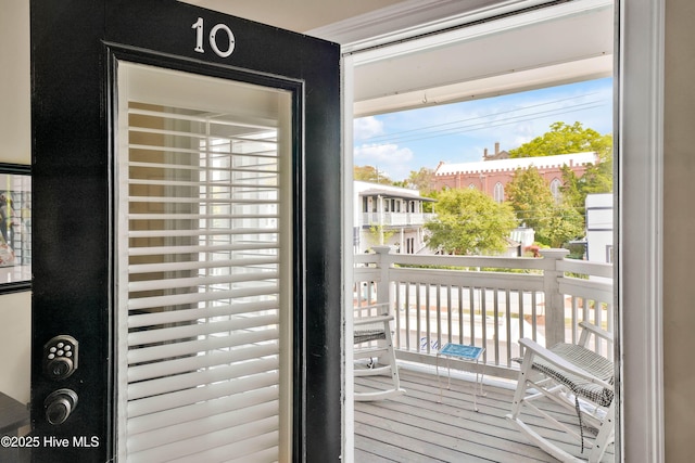 doorway featuring wood finished floors
