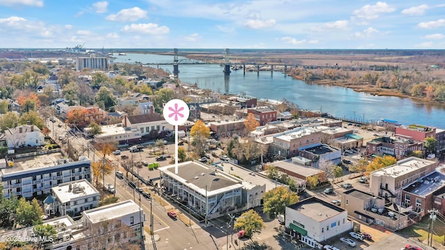 drone / aerial view with a water view