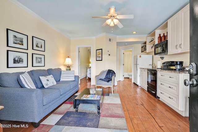 living room featuring visible vents, ceiling fan, light wood-type flooring, crown molding, and recessed lighting