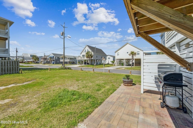 view of yard featuring a residential view