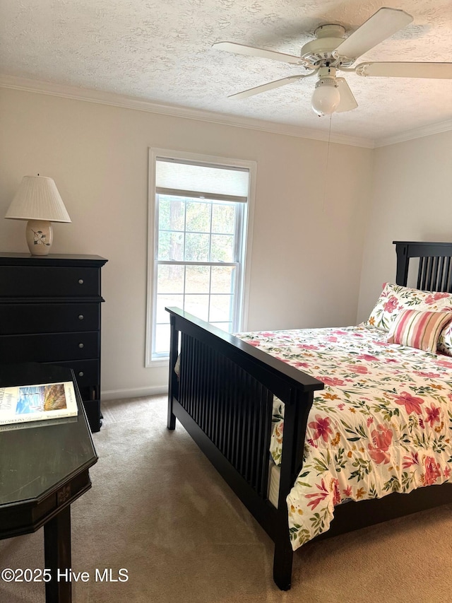 1735 W Pennsylvania Ave, Southern Pines, NC 28387 - carpeted bedroom with ornamental molding, a textured ceiling, and ceiling fan