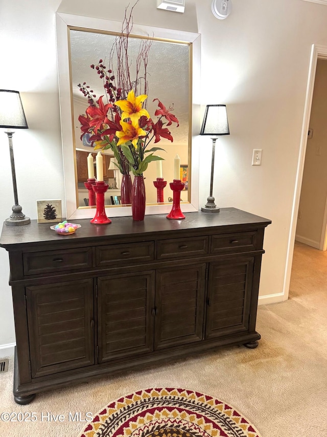 1735 W Pennsylvania Ave, Southern Pines, NC 28387 - bar area featuring light carpet and baseboards