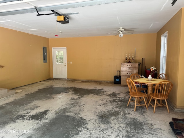 1735 W Pennsylvania Ave, Southern Pines, NC 28387 - garage with a garage door opener, electric panel, and ceiling fan