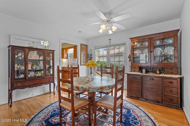 1 Vail Pl, Pinehurst, NC 28374 - dining space featuring baseboards, ceiling fan, and wood finished floors