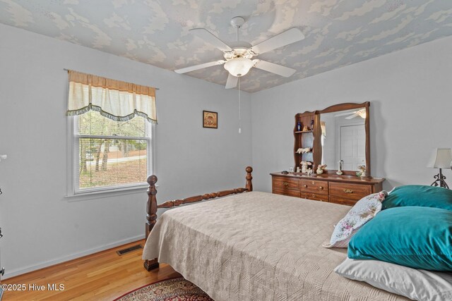 1 Vail Pl, Pinehurst, NC 28374 - bedroom with a closet, visible vents, light wood finished floors, ceiling fan, and baseboards