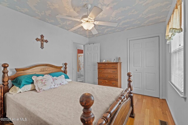 1 Vail Pl, Pinehurst, NC 28374 - bedroom featuring a textured ceiling, baseboards, and wood finished floors