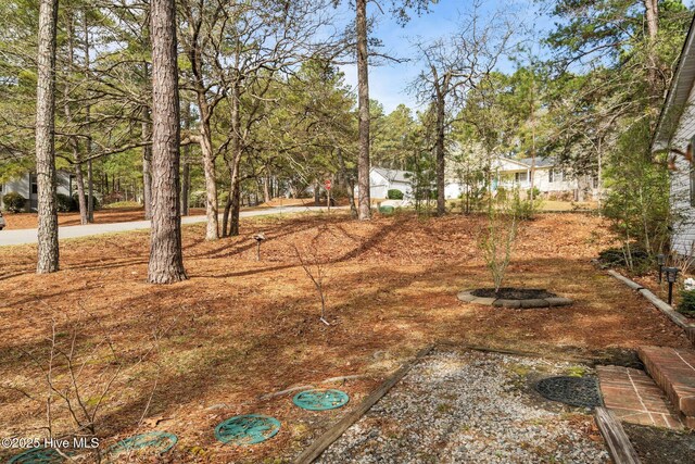 1 Vail Pl, Pinehurst, NC 28374 - view of patio / terrace featuring grilling area, fence, and a wooden deck