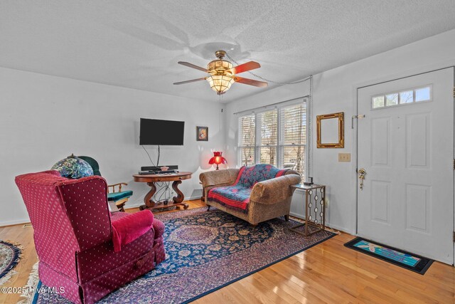 1 Vail Pl, Pinehurst, NC 28374 - living area featuring ceiling fan, a textured ceiling, and wood finished floors