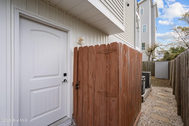 1317 Bowfin Ln Unit 2, Carolina Beach, NC 28428 - property entrance featuring central AC unit