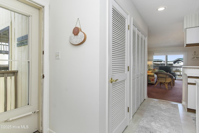 hallway featuring recessed lighting