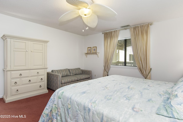 carpeted bedroom featuring a ceiling fan