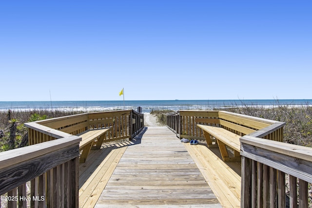 view of community featuring a view of the beach and a water view
