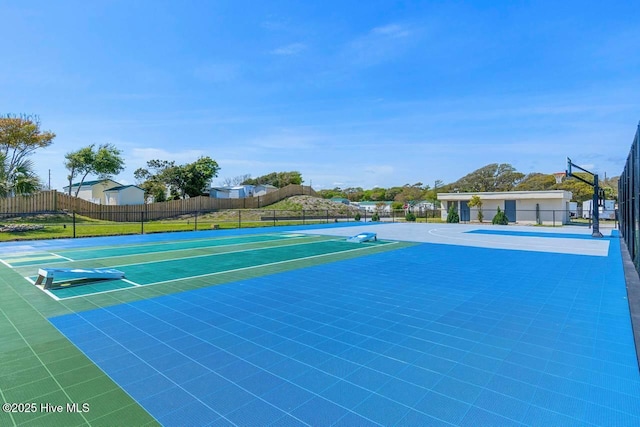 exterior space with fence and community basketball court