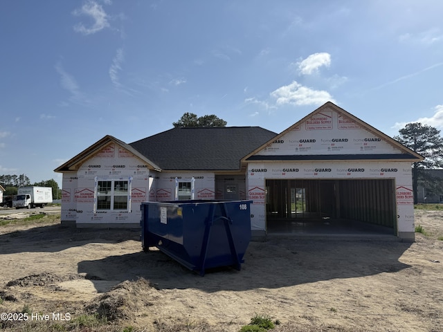 100 Nova Pl, Pikeville, NC 27683 - view of front facade with a garage and dirt driveway