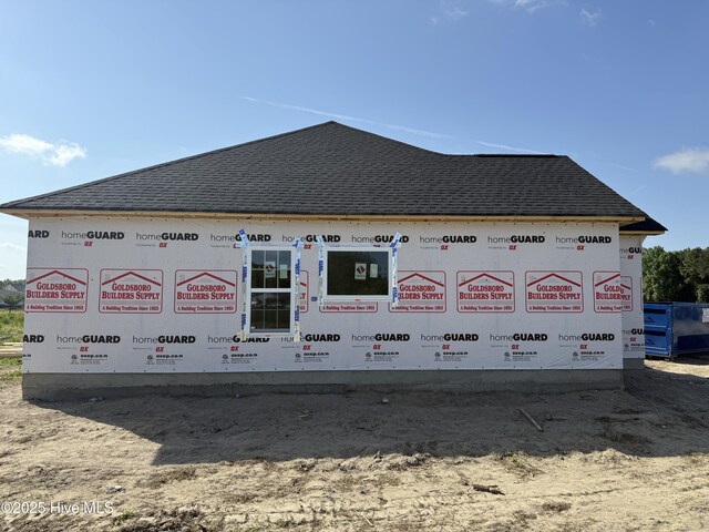 100 Nova Pl, Pikeville, NC 27683 - view of side of home featuring a shingled roof