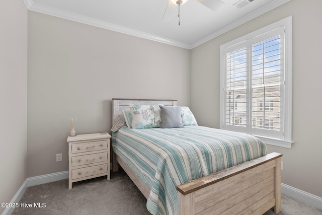 carpeted bedroom featuring ceiling fan, crown molding, and baseboards
