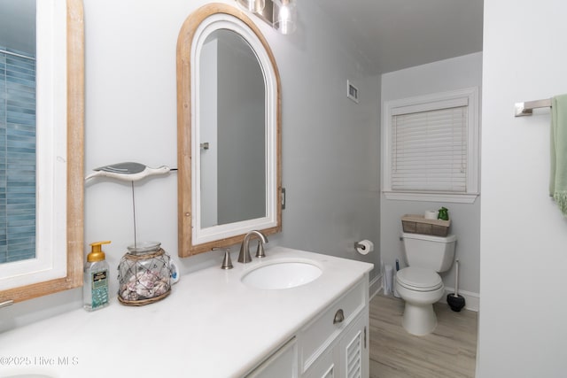 206 Robin Ln, Edenton, NC 27932 - bathroom featuring toilet, vanity, wood finished floors, and baseboards
