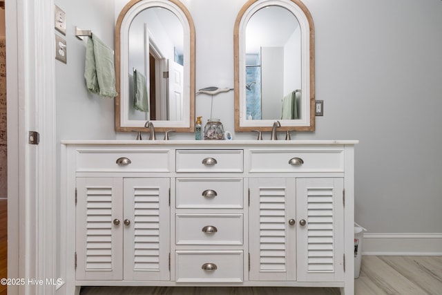 206 Robin Ln, Edenton, NC 27932 - full bathroom with double vanity and wood finished floors