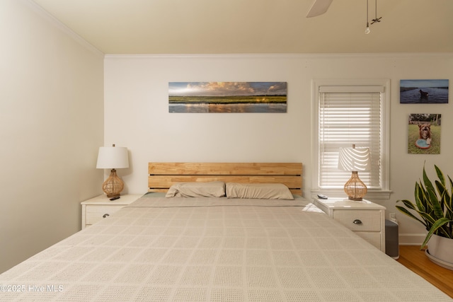 206 Robin Ln, Edenton, NC 27932 - unfurnished bedroom featuring ornamental molding, wood finished floors, and a ceiling fan