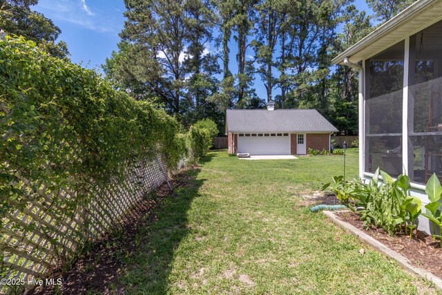 206 Robin Ln, Edenton, NC 27932 - view of yard with an outdoor structure and a sunroom