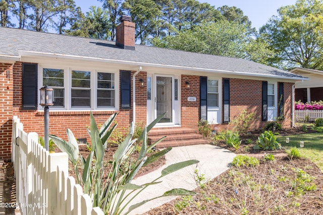 206 Robin Ln, Edenton, NC 27932 - single story home with brick siding, a chimney, and roof with shingles