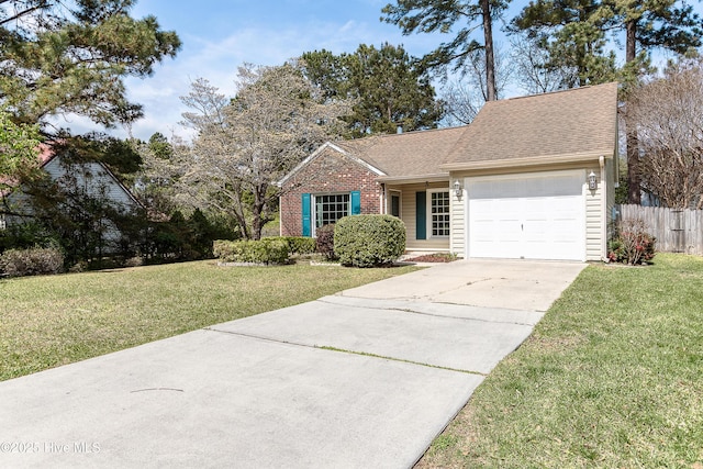 single story home with roof with shingles, fence, driveway, a front yard, and a garage