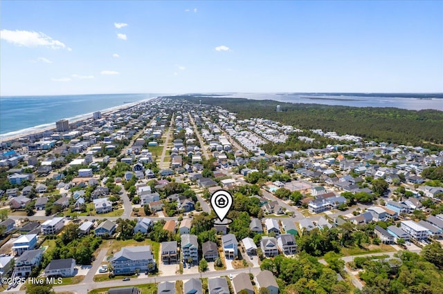 bird's eye view featuring a water view and a residential view