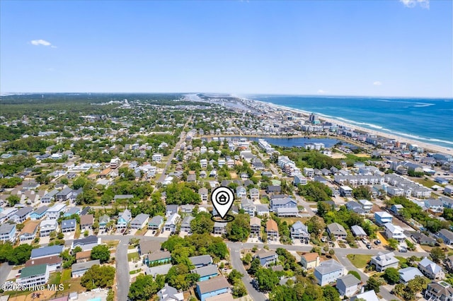 aerial view featuring a water view and a residential view
