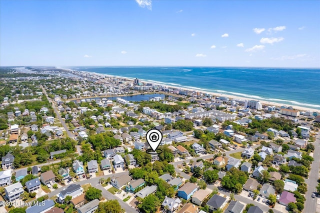 bird's eye view featuring a water view and a residential view