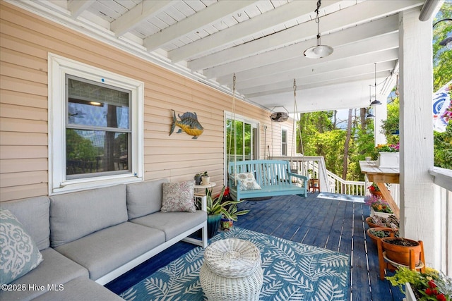 deck with a porch and an outdoor living space